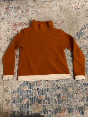 Dudley Stephens Rust Turtleneck with Cream Contrast Hem